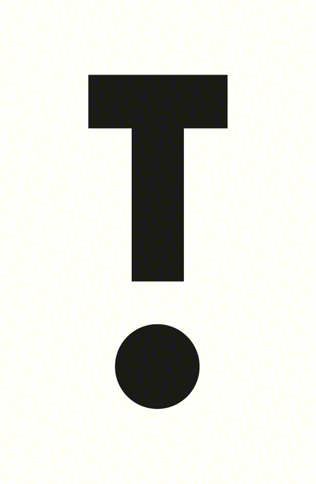 T.